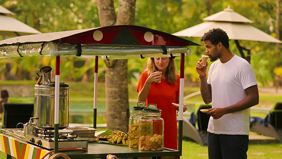 Tea stall and local snacks near the pool every evening at beach resort Kerala